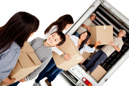 Enfield removals team handling furniture with care during a move