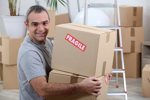 Man and van removals team working in Enfield near residential properties