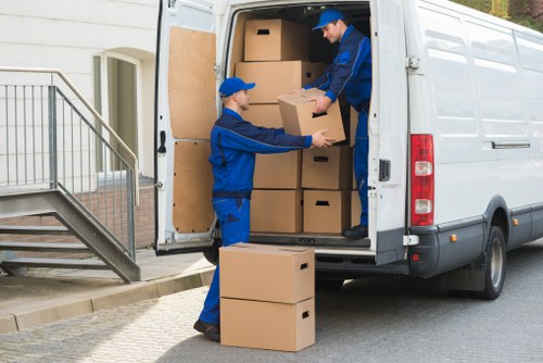 Removal team sorting recyclable packing materials during an Enfield move