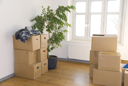 Packed boxes and furniture inside a removal van