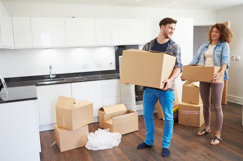 Packing supplies and labelled boxes ready for a house move in Enfield