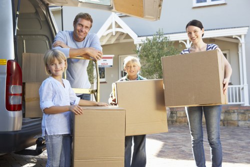 Loading furniture and boxes into a removal van in Enfield