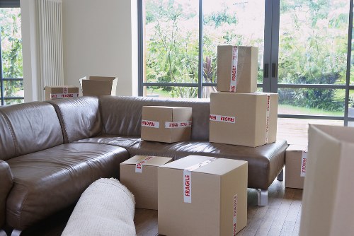 Business equipment and office furniture being prepared for a move
