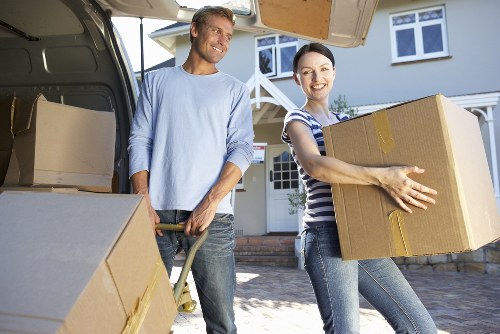 Moving team loading boxes for a house move in Enfield